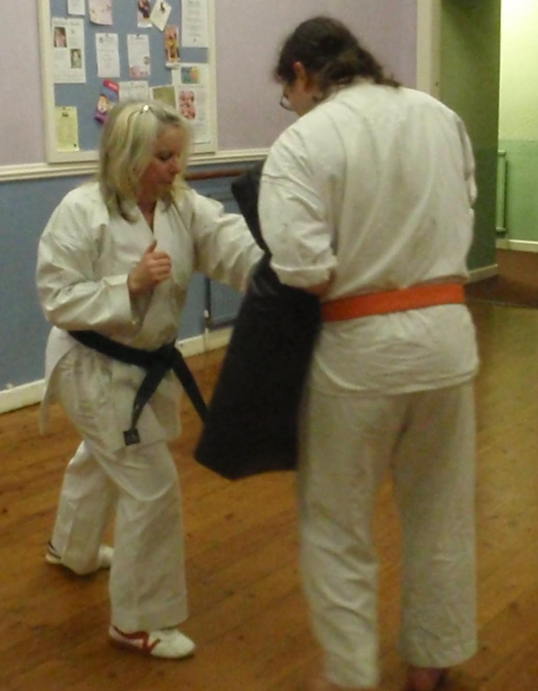 Regular padwork is essential to develop effective strikes